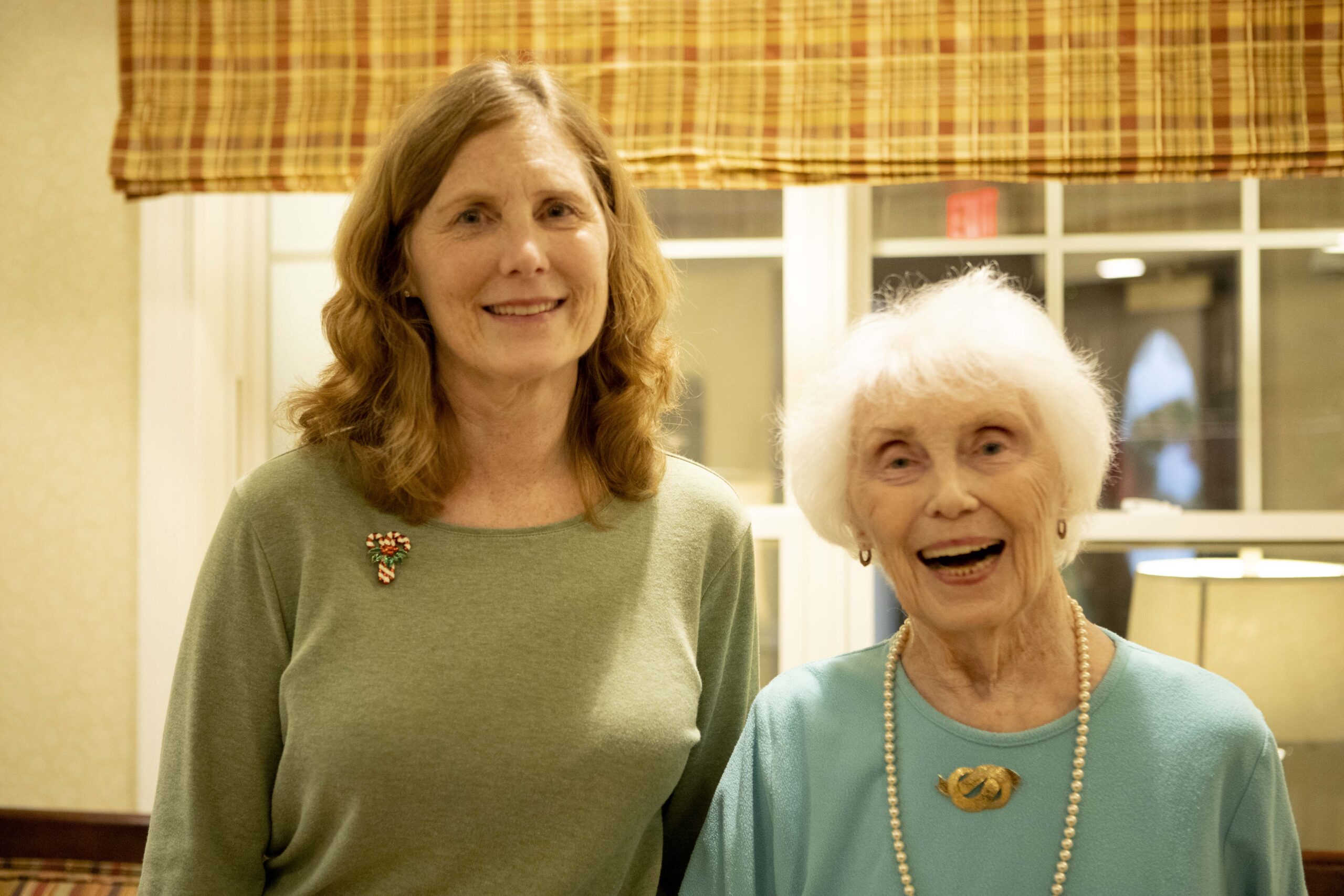 mother and daughter smiling