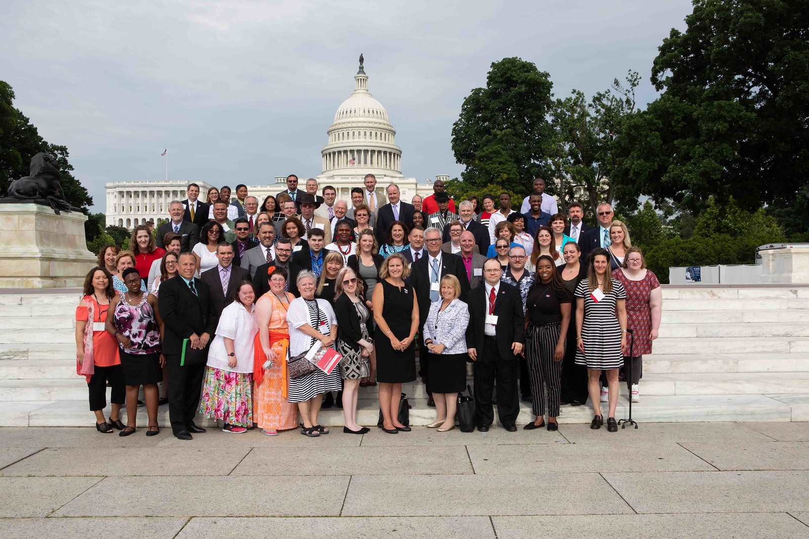 Group standing in front of Capitol