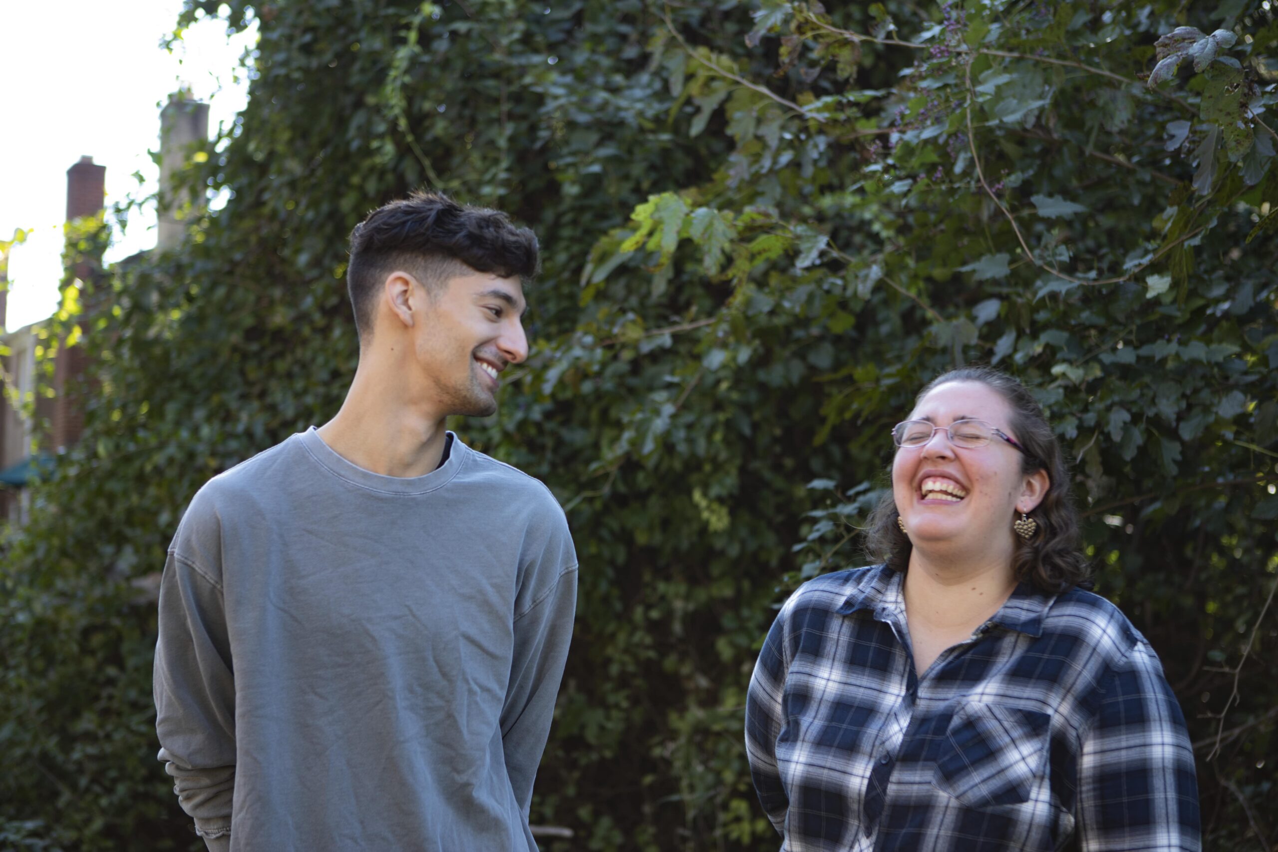 Two people laughing together