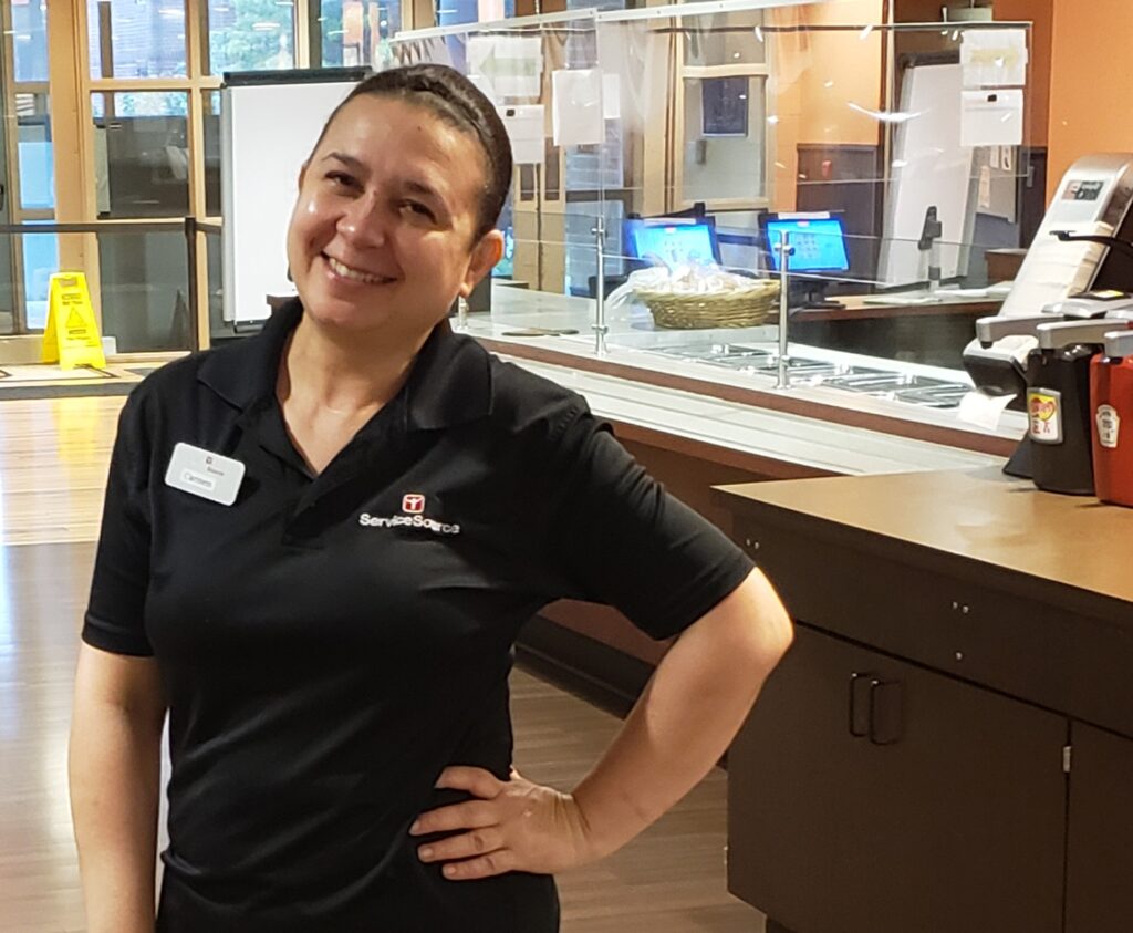 Person standing in front of buffet line