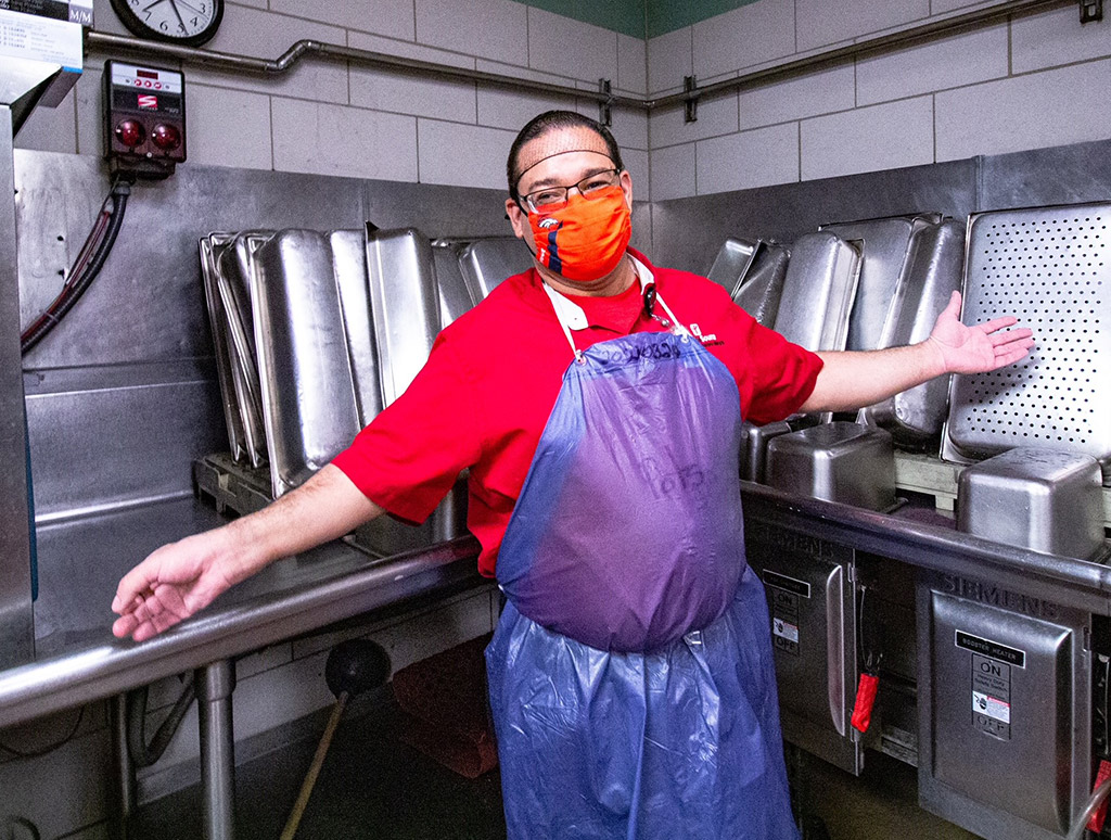 Man washing dishes