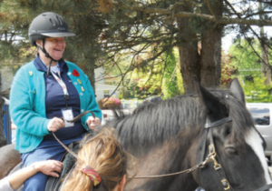 woman riding horse