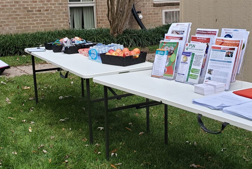 Image of a registration table with forms