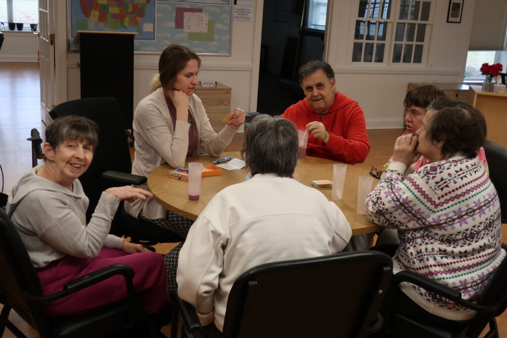 People playing games at a round table